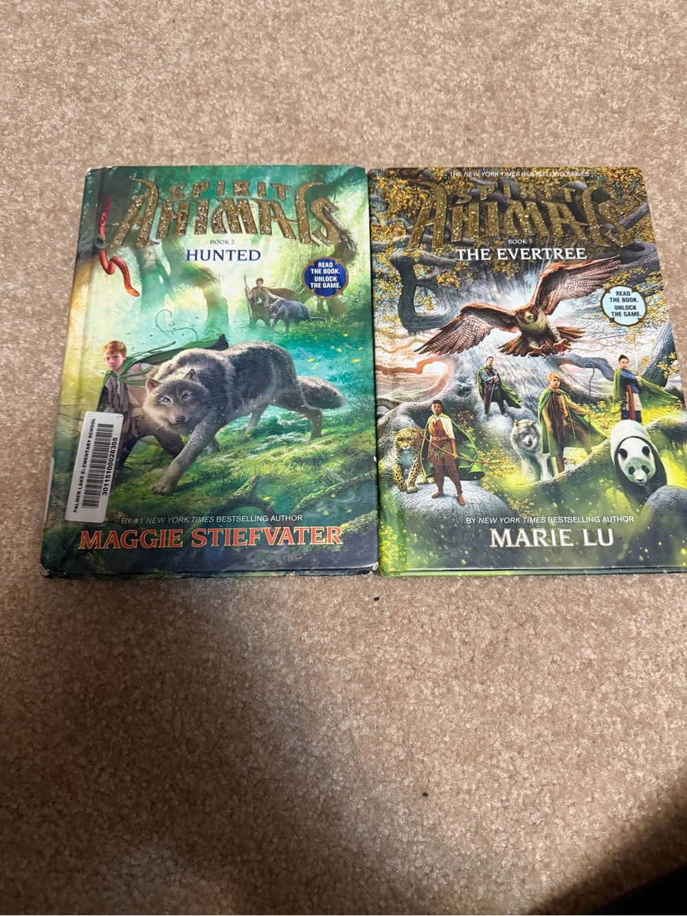 Lot of 2 hardcover fantasy novels from the Spirit Animals book series